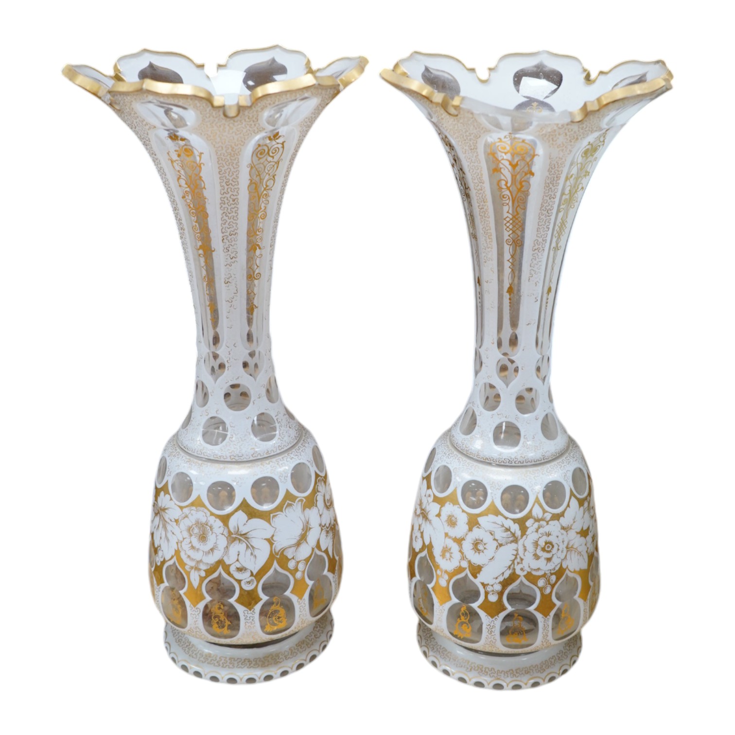 A pair of late 19th century Bohemian overlaid glass vases, 37.5cm. Condition - one has loose (but present) piece at rim